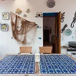 Il Pesce E Il Geco ليباري